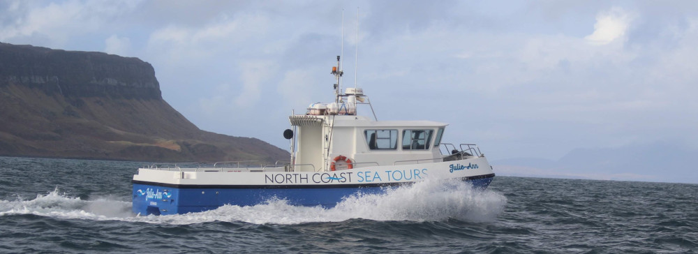 Julie-Ann heading out past Eigg